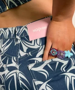 New Girl Order TATTOO DENIM CUT OUT FLARES